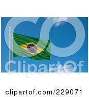 The Flag Of Brazil Waving On A Pole Against A Blue Sky