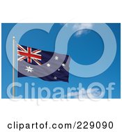 Royalty Free RF Clipart Illustration Of The Flag Of Australia Waving On A Pole Against A Blue Sky by stockillustrations