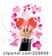 Poster, Art Print Of Mans Hand Holding A Red Heart Over Pink And White