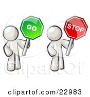 White Men Holding Red And Green Stop And Go Signs
