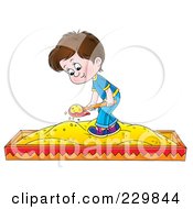 Boy Playing In A Sand Box - 2