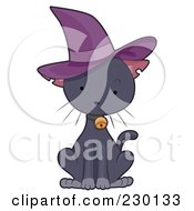 Cute Black Kitten Wearing A Purple Witch Hat
