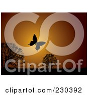 Royalty Free RF Clipart Illustration Of A Silhouetted Butterfly At Sunset Over Trees