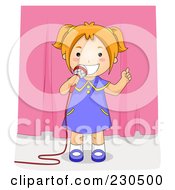 Poster, Art Print Of Happy School Girl Using A Microphone On Stage