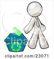 White Man Tossing A Plastic Container Into A Recycle Bin Symbolizing Someone Doing Their Part To Help The Environment And To Be Earth Friendly