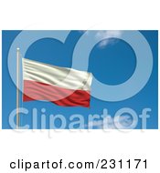 Flag Of Poland Waving On A Pole Against A Blue Sky