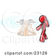 Red Businessman Talking On A Cell Phone A Communications Tower In The Background