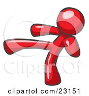 Clipart Illustration Of A Red Man Kicking Perhaps While Kickboxing