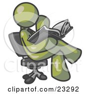 Olive Green Man Sitting Cross Legged In A Chair And Reading A Book