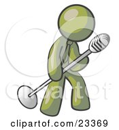 Olive Green Man In A Tie Singing Songs On Stage During A Concert Or At A Karaoke Bar While Tipping The Microphone