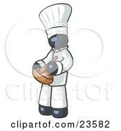 Navy Blue Baker Chef Cook In Uniform And Chefs Hat Stirring Ingredients In A Bowl by Leo Blanchette