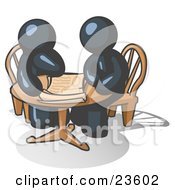 Two Navy Blue Businessmen Sitting At A Table Discussing Papers