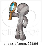 Gray Man Holding Up A Magnifying Glass And Peering Through It While Investigating Or Researching Something