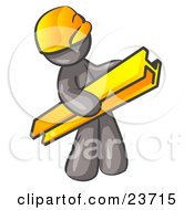 Gray Man Construction Worker Wearing A Hardhat And Carrying A Beam At A Work Site