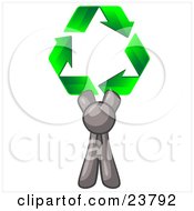 Gray Man Holding Up Three Green Arrows Forming A Triangle And Moving In A Clockwise Motion Symbolizing Renewable Energy And Recycling