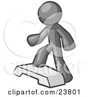Gray Man Doing Step Ups On An Aerobics Platform While Exercising