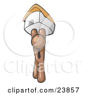 Brown Man Holding Up A House Over His Head Symbolizing Home Loans And Realty