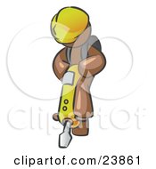 Poster, Art Print Of Brown Construction Worker Man Wearing A Hardhat And Operating A Yellow Jackhammer While Doing Road Work