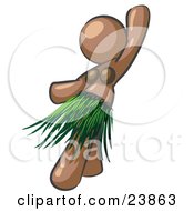Brown Hula Dancer Woman In A Grass Skirt And Coconut Shells Performing At A Luau