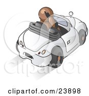 Brown Businessman Talking On A Cell Phone While Driving In A White Convertible Car
