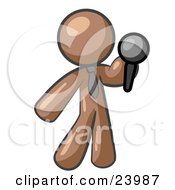 Brown Man A Comedian Or Vocalist Wearing A Tie Standing On Stage And Holding A Microphone While Singing Karaoke Or Telling Jokes