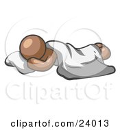 Comfortable Brown Man Sleeping On The Floor With A Sheet Over Him