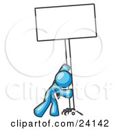 Poster, Art Print Of Strong Light Blue Man Pushing A Blank Sign Upright