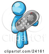 Light Blue Man Holding A Remote Control To A Television
