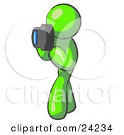 Clipart Illustration Of A Lime Green Man Character Tourist Or Photographer Taking Pictures With A Camera