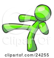 Clipart Illustration Of A Lime Green Man Kicking Perhaps While Kickboxing