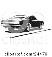 1970 Barracuda Muscle Car With Dual Exhaust Pipes Parked In Black And White