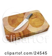 Clipart Illustration Of A Sharp Kitchen Knife On Top Of A Wooden Cutting Board