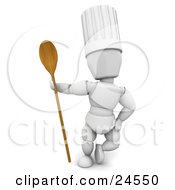 White Character In A Chefs Hat Standing With A Wooden Spoon