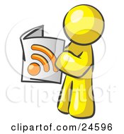 Yellow Man Standing And Reading An Rss Magazine