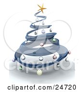 Blue Glass Spiral Christmas Tree With A Gold Star On Top Decorated With Colorful Baubles Over White