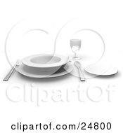 Fork And Butter Kife With A White Soup Bowl On A Saucer With A Small Plate And Drinking Glass On A Table