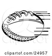 Clipart Picture Of An American Football Rushing Through The Air During A Game by Andy Nortnik