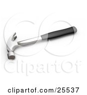 Clipart Illustration Of A Black Handled Hammer Resting On A Surface by KJ Pargeter