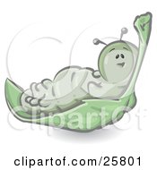 Clipart Illustration Of A Cute Green Caterpillar Character Lounging On A Leaf by Leo Blanchette