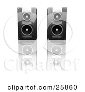Pair Of Black Radio Speakers Side By Side On A Reflective White Surface