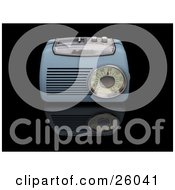 Clipart Illustration Of A Vintage Blue Radio With A Station Tuner On A Reflective Black Surface