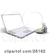 Clipart Illustration Of A White Character Carrying A Cd To A Laptop Computer
