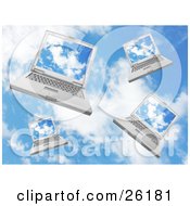 Four Laptop Computers Falling In A Cloudy Blue Sky