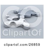 Clipart Illustration Of Two Light And Dark Silver Jigsaw Puzzle Pieces Resting Beside Each Other