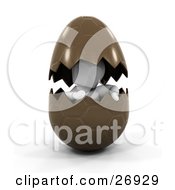Clipart Illustration Of A White Character Hatching Out From A Cracked Brown Easter Egg