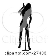 Clipart Illustration Of A Silhouetted Female Singer On Stage Singing With A Microphone During A Music Concert by elaineitalia #COLLC27403-0046