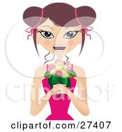 Happy Caucasian Woman In A Pink Dress Smiling And Holding A Bunch Of Pink And White Flowers