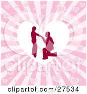 Silhouetted Man On His Knees Proposing To A Woman Inside A White Heart Over A Pink Bursting Heart Background
