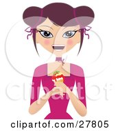 Happy Brunette Caucasian Woman In A Pink Dress Smiling And Holding An Ice Cream Cone