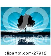 Poster, Art Print Of Tree And Grasses Reflecting In Calm Blue Waters And Silhouetted Against A Bursting Sky Background